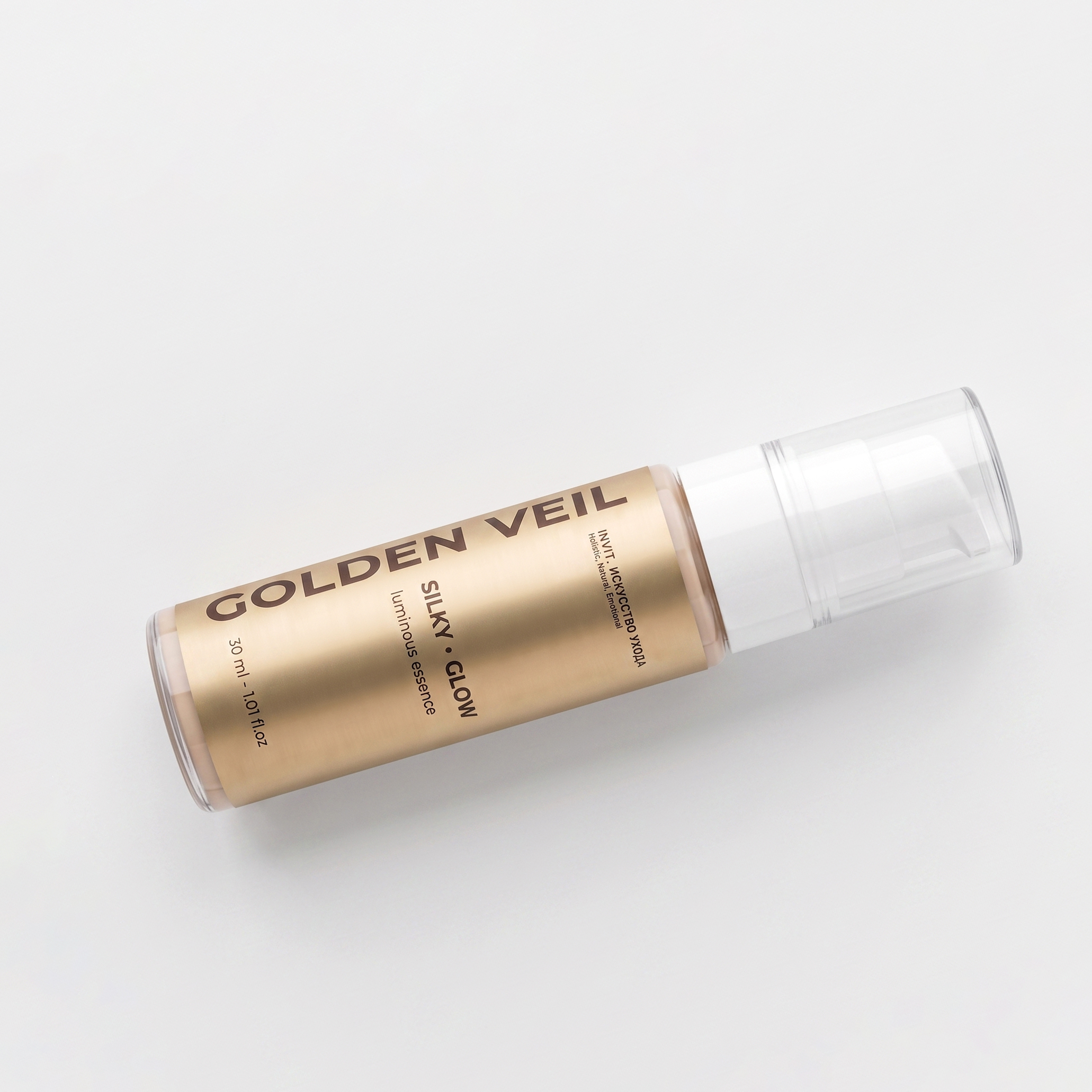 Фото Сияющая эссенция с эффектом BB-хайлайтера и уходовой сыворотки Golden Veil Luminous Essence, 30 мл